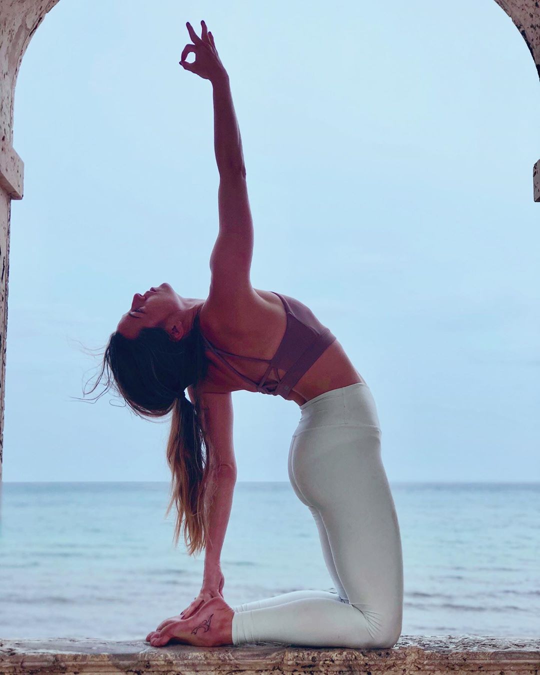 Find out why doing yoga on the beach allows for a deeper meditation - interview with yoga teacher Dara Starcove Fashion