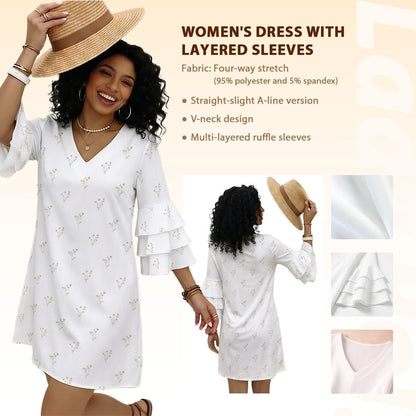 Woman wearing a white dress with layered sleeves, holding a straw hat, on a beige background.