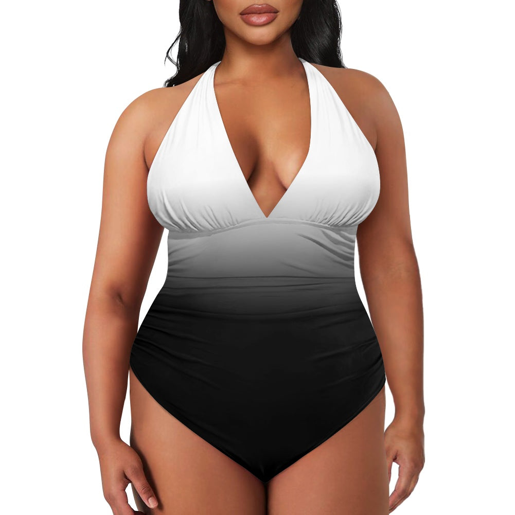 Woman wearing a white, gray, and black gradient swimsuit on a white background