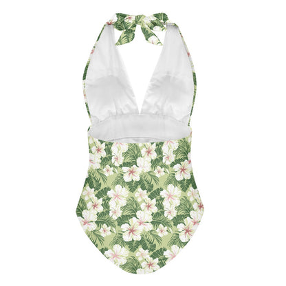 One-piece swimsuit with floral design on a white background